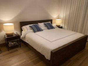 Postel nebo postele na pokoji v ubytování Luxury new apartment in Cap Cana Punta Cana