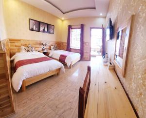 TV a/nebo společenská místnost v ubytování Dang Khoa Garden Inn Homestay