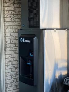 an ice box with a blue eye inside of it at Regency Inn in Gatesville