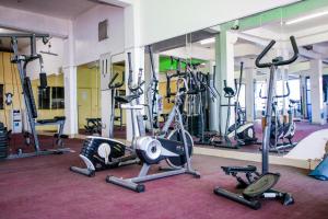 a gym with a bunch of exercise bikes in it at The Siron Place Hotel in Ongata Rongai 