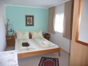 מיטה או מיטות בחדר ב-Haus Gradwohl