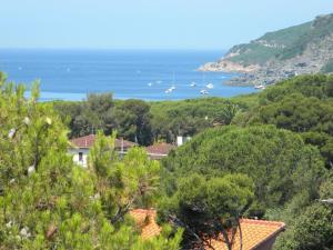 a view of the ocean from a resort at Hotel Rosa Del Tirreno in Quercianella