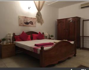 Postel nebo postele na pokoji v ubytování Embiente Guest House