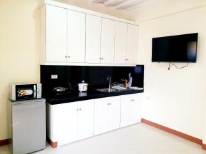 A kitchen or kitchenette at MS Residence Building