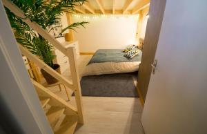 Llit o llits en una habitació de AppartUnique - Chez Helder