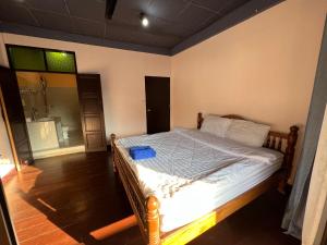Postel nebo postele na pokoji v ubytování Madera House Chiang Mai