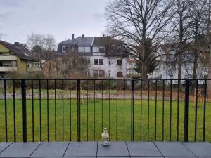 a fire hydrant sitting in front of a fence at Zentrum,Modern,Silently,New Property,Parking Place,Netflix in Wetzlar