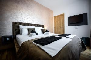 Postel nebo postele na pokoji v ubytování Apartman Sparta Zlatibor