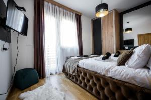 Postel nebo postele na pokoji v ubytování Apartman Sparta Zlatibor