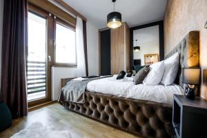 Postel nebo postele na pokoji v ubytování Apartman Sparta Zlatibor