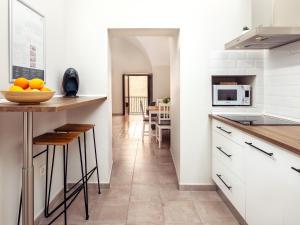 Kuchyňa alebo kuchynka v ubytovaní Apartamentos Plaza Mayor 35