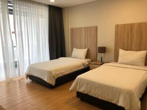 D Gateway Perdana Hotel Bangi客房内的一张或多张床位