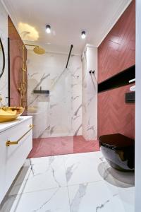 Kúpeľňa v ubytovaní LAGUNA Apartament Polanica Residence 6 z garażem SPA