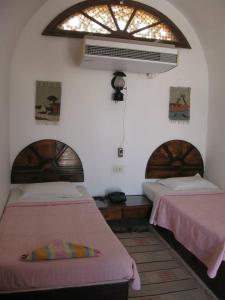 Letto o letti in una camera di Lagona Dahab Hotel