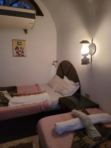Letto o letti in una camera di Lagona Dahab Hotel