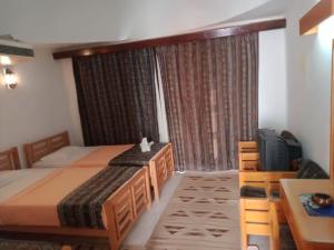 Letto o letti in una camera di Lagona Dahab Hotel