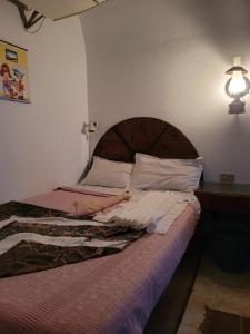 Letto o letti in una camera di Lagona Dahab Hotel
