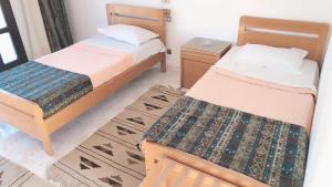 Letto o letti in una camera di Lagona Dahab Hotel