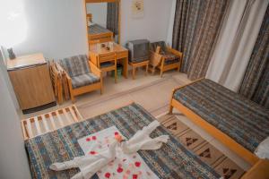 Letto o letti in una camera di Lagona Dahab Hotel
