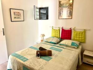 Postel nebo postele na pokoji v ubytování Ti Cabanon. Appartement vue mer à Deshaies.
