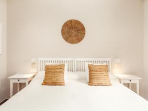 Posteľ alebo postele v izbe v ubytovaní Apartamentos Plaza Mayor 35
