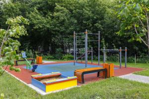 a playground in a park with a play equipment at 1 ART HOTEL in Moscow