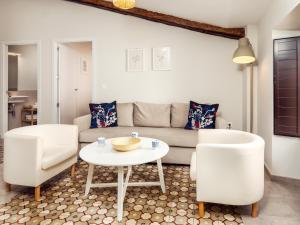 Posedenie v ubytovaní Apartamentos Plaza Mayor 35