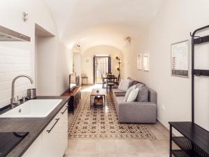 Posedenie v ubytovaní Apartamentos Plaza Mayor 35