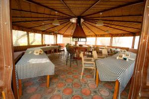 A restaurant or other place to eat at Alpstar Camping & Restaurant