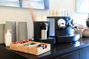 Kemudahan buat kopi dan teh di Hotel Banana City Winterthur