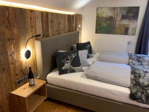 Łóżko lub łóżka w pokoju w obiekcie Chalet Apart Hansler