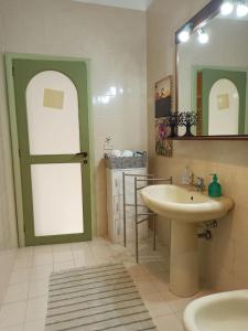 Koupelna v ubytování Ficodindia Rooms + 37 fotografií