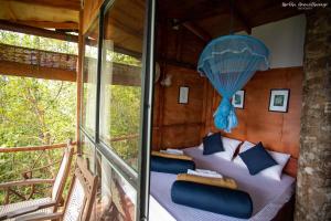 Χώρος καθιστικού στο Tree Houses by Jungle River