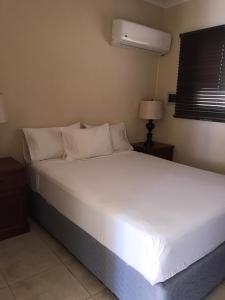 Postel nebo postele na pokoji v ubytování Kudawecha 40