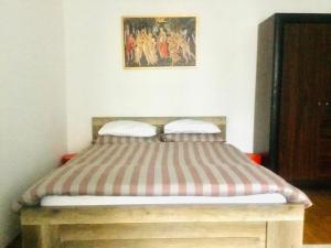 Posteľ alebo postele v izbe v ubytovaní Zamoyskiego