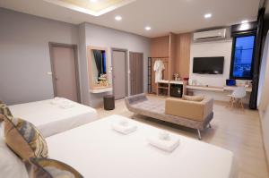Voodi või voodid majutusasutuse The Space Hotel Chiang Rai toas
