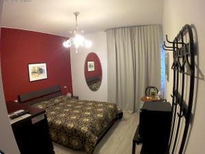 Postel nebo postele na pokoji v ubytování il Riccio B&B
