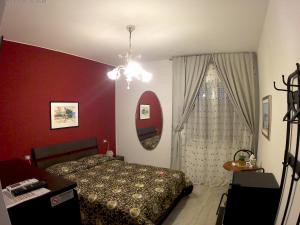 Postel nebo postele na pokoji v ubytování il Riccio B&B