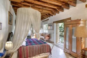 Postel nebo postele na pokoji v ubytování Quinta Cielo - Hotel Boutique y Restaurante