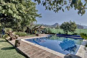 Bazén v ubytování Quinta Cielo - Hotel Boutique y Restaurante nebo v jeho okolí