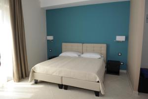 En eller flere senge i et værelse på Guest House San Domenico + 16 billeder