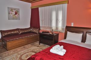 Uma cama ou camas num quarto em Traditional Guesthouse Alkistis
