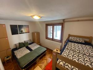 Letto o letti in una camera di Rustic Home Tara
