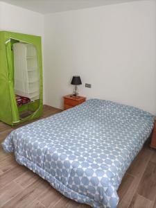 Postel nebo postele na pokoji v ubytování Apartment Taliarte 36