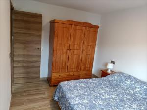 Ein Bett oder Betten in einem Zimmer der Unterkunft Apartment Taliarte 36