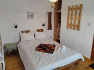 A bed or beds in a room at Casa Lambuh