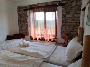 A bed or beds in a room at Casa Lambuh