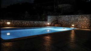 The swimming pool at or close to Evreti Villa with Stunning views, near Fiscardo