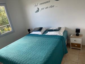 Voodi või voodid majutusasutuse TURQUOISE CARAIBES toas