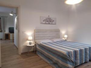 Postel nebo postele na pokoji v ubytování La casa di Primo